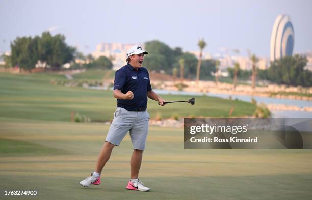 Sami Valimaki of Finland celebrates victory on the first play-off hole during Day Four of the Commercial Bank Qatar Masters at Doha Golf Club on...