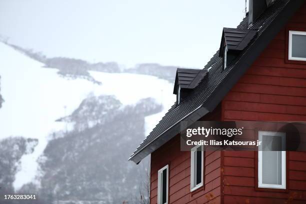 defocused snow capped mountain on the background - hirafu snow resort stock pictures, royalty-free photos & images