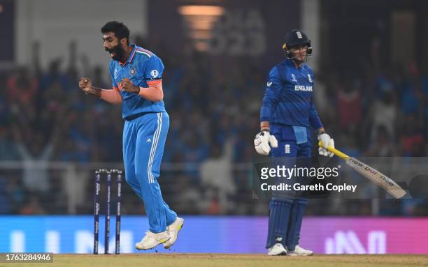 Jasprit Bumrah of India celebrates the wicket of Joe Root of England during the ICC Men's Cricket World Cup India 2023 between India and England at...