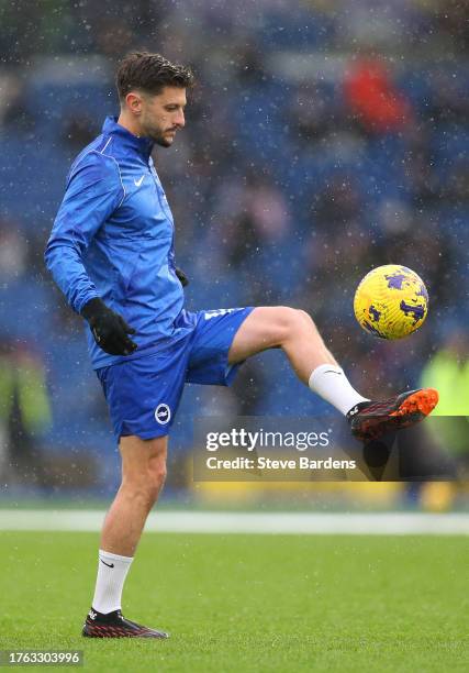 Adam Lallana of Brighton & Hove Albion warms up prior to the Premier League match between Brighton & Hove Albion and Fulham FC at American Express...