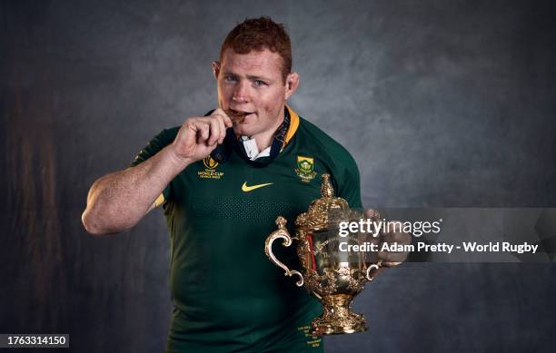 Steven Kitshoff of South Africa poses with the Webb Ellis Cup during the South Africa Winners Portrait shoot after the Rugby World Cup Final match...