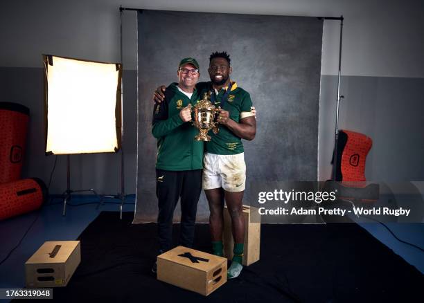 Jacques Nienaber, Head Coach of South Africa and Siya Kolisi of South Africa pose with the Webb Ellis Cup during the South Africa Winners Portrait...