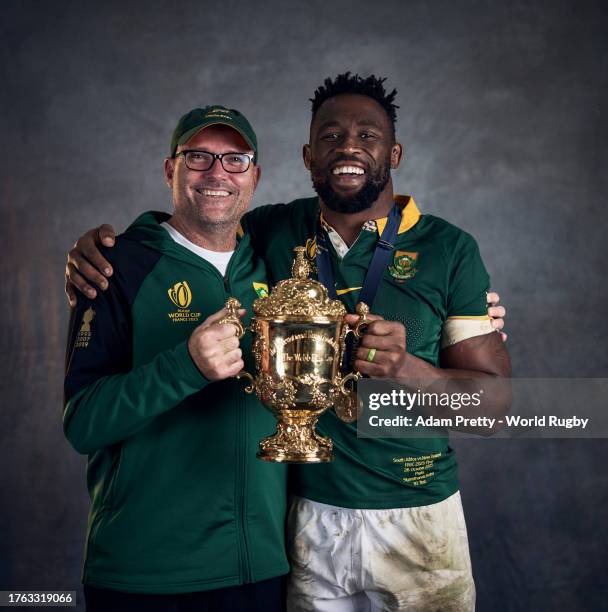 Jacques Nienaber, Head Coach of South Africa and Siya Kolisi of South Africa pose with the Webb Ellis Cup during the South Africa Winners Portrait...