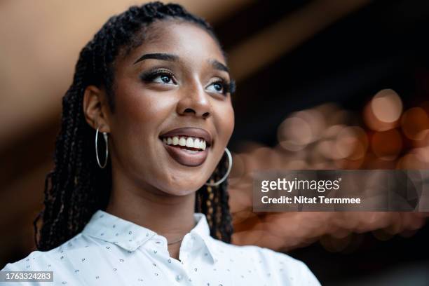 gen z's entrepreneurial spirit can grow your business. portrait of an african-american young businesswoman looking over ahead in a modern business office. young business entrepreneurial. - continuing development stock pictures, royalty-free photos & images