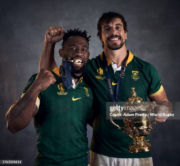 Siya Kolisi and Eben Etzebeth of South Africa poses with the Webb Ellis Cup during the South Africa Winners Portrait shoot after the Rugby World Cup...