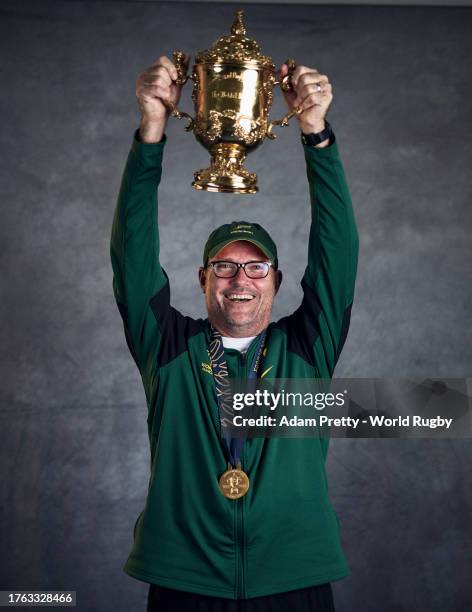 Jacques Nienaber, Head Coach of South Africa, poses with the Webb Ellis Cup during the South Africa Winners Portrait shoot after the Rugby World Cup...