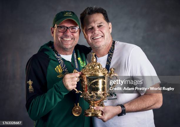 Jacques Nienaber, Head Coach of South Africa, and Rassie Erasmus, Coach of South Africa, pose with the Webb Ellis Cup during the South Africa Winners...