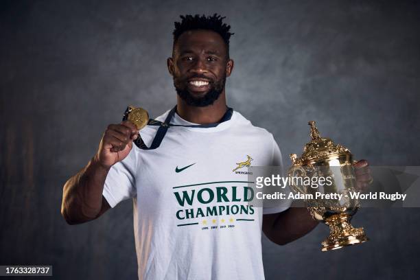 Siya Kolisi of South Africa of South Africa poses with the Webb Ellis Cup during the South Africa Winners Portrait shoot after the Rugby World Cup...