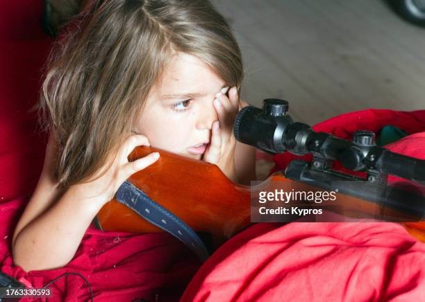 male child age seven years - air gun stock pictures, royalty-free photos & images