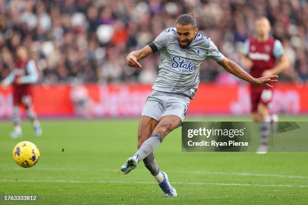 Dominic Calvert-Lewin of Everton shoots but misses during the Premier League match between West Ham United and Everton FC at London Stadium on...