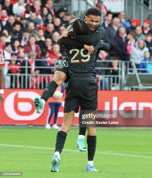 Warren Zaire-Emery of Paris Saint-Germain celebrates his first goal with Bradley Barcola during the Ligue 1 Uber Eats match between Stade Brestois 29...