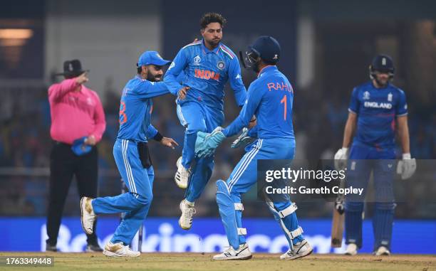 Kuldeep Yadav of India celebrates the wicket of Liam Livingstone of England during the ICC Men's Cricket World Cup India 2023 between India and...