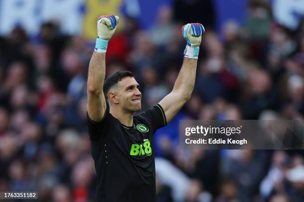 Emiliano Martinez of Aston Villa celebrates his team's third goal, an own-goal scored by Tom Lockyer of Luton Town during the Premier League match...