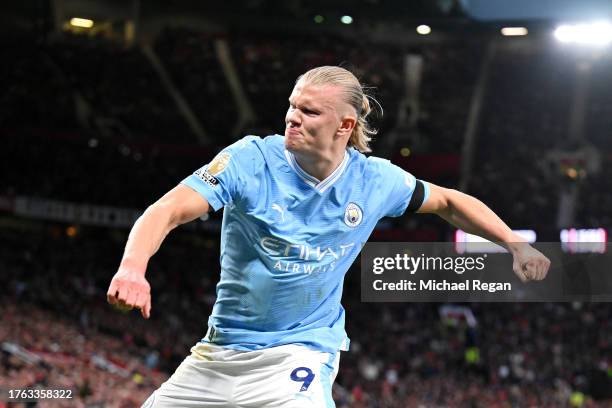 Erling Haaland of Manchester City celebrates after scoring the team's first goal from a penalty kick during the Premier League match between...