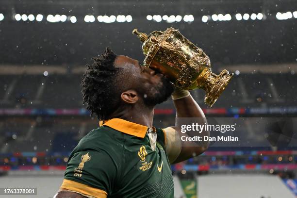 Siya Kolisi of South Africa celebrates with the The Webb Ellis Cup following his side's victory in the Rugby World Cup France 2023 Gold Final match...