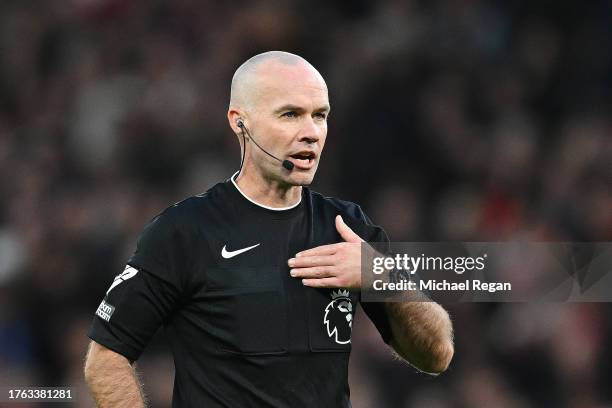Referee Paul Tierney looks on during the Premier League match between Manchester United and Manchester City at Old Trafford on October 29, 2023 in...