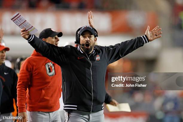 Ryan Day head coach of the Ohio State Buckeyes reacts to a penalty called on Ohio State Buckeyes during the game against the Wisconsin Badgers at...