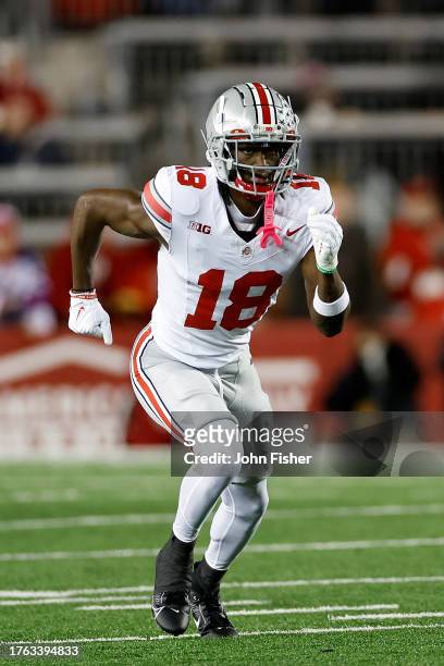 Marvin Harrison Jr. #18 of the Ohio State Buckeyes during the game against the Wisconsin Badgers at Camp Randall Stadium on October 28, 2023 in...
