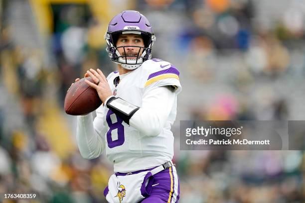 Kirk Cousins of the Minnesota Vikings warms up prior to a game against the Green Bay Packers at Lambeau Field on October 29, 2023 in Green Bay,...