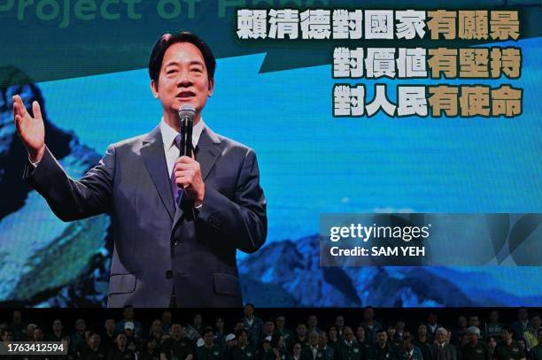 Large screen shows Lai Ching-te , presidential candidate for 2024 from the ruling Democratic Progressive Party , gesturing during a campaign rally in...