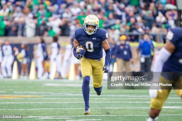 Xavier Watts of Notre Dame returns his interception during a game between University of Pittsburgh and University of Notre Dame at Notre Dame Stadium...