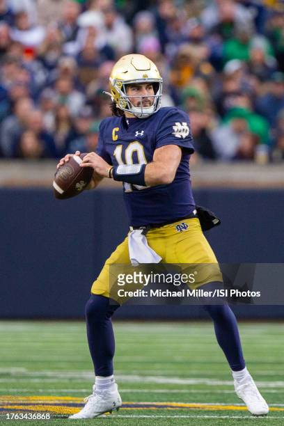 Sam Hartman of Notre Dame prepares to throw the ball during a game between University of Pittsburgh and University of Notre Dame at Notre Dame...