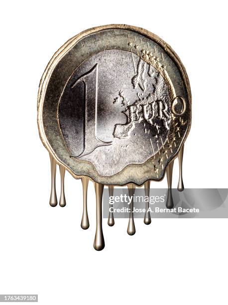 one euro coin of the european union melts on a white background. - euro symbol stock pictures, royalty-free photos & images