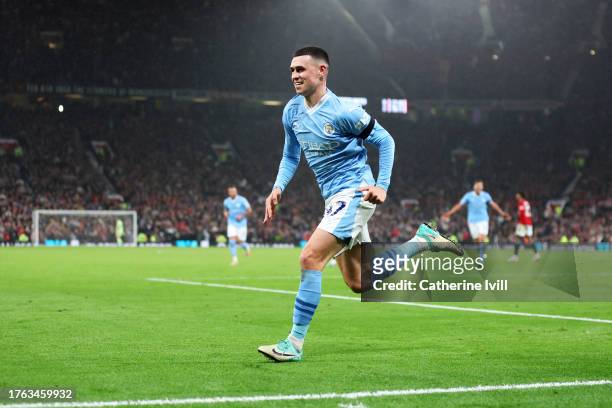 Phil Foden of Manchester City celebrates after scoring the team's third goal during the Premier League match between Manchester United and Manchester...