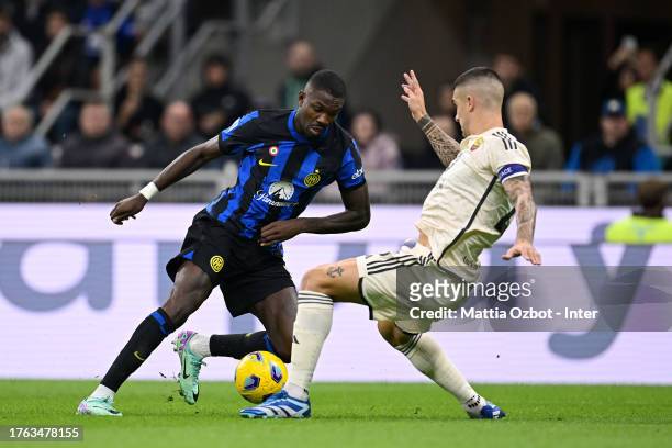 Marcus Thuram of FC Internazionale, in action, battles for the ball during the Serie A TIM match between FC Internazionale and AS Roma at Stadio...