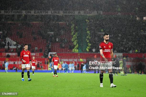 Bruno Fernandes of Manchester United looks dejected after the team's defeat in the Premier League match between Manchester United and Manchester City...
