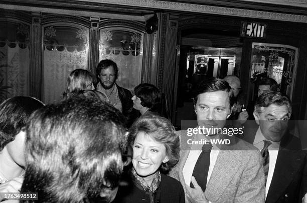 Berthe Jourdan and Louis Jourdan attend a party, celebrating the publication of Alexander Walker's "The Shattered Silents," at the Bistro restaurant...