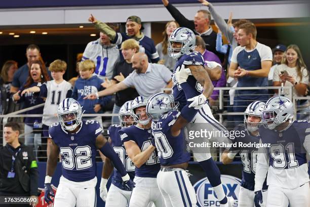 Sam Williams of the Dallas Cowboys celebrates after a second quarter interception against the Los Angeles Rams at AT&T Stadium on October 29, 2023 in...