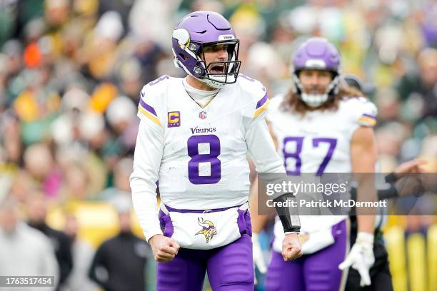 Kirk Cousins of the Minnesota Vikings reacts after a penalty in the first quarter of a game against the Green Bay Packers at Lambeau Field on October...
