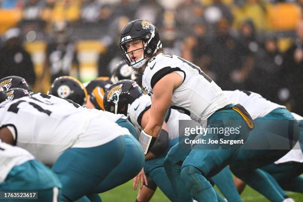 Trevor Lawrence of the Jacksonville Jaguars calls a play during the first quarter of the game against the Pittsburgh Steelers at Acrisure Stadium on...
