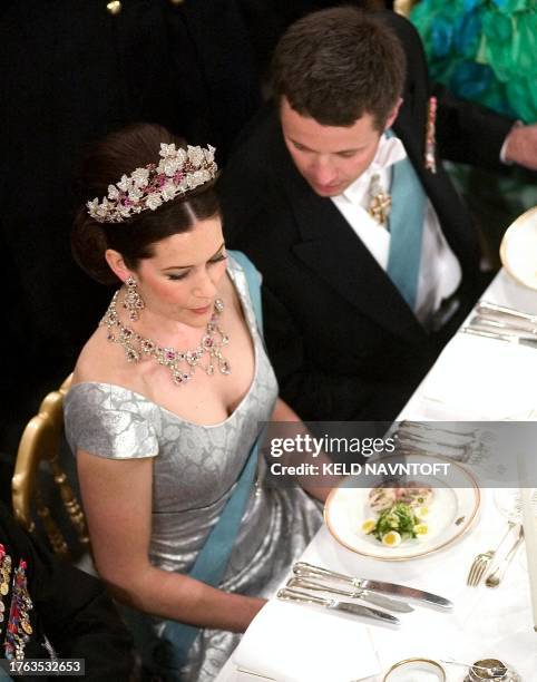 Danish Crown Prince Frederik addresses his fiancee, Australian Mary Donaldson, at the start of the gala-dinner attended by 375 Danish officials 11...