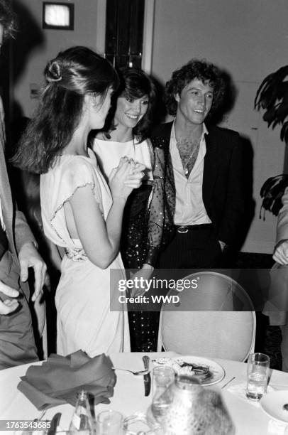 Pam Dawber , Victoria Principal, and Andy Gibb attend an event in Los Angeles, California, on June 15, 1981.
