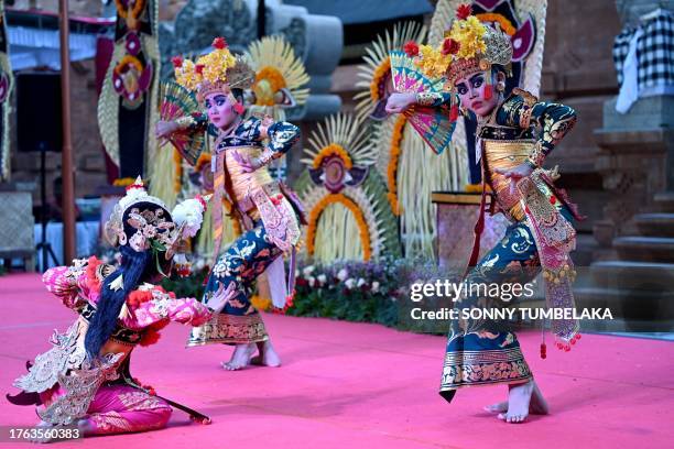 Balinese dancers perform a Legong Kraton traditional dance in front Jagatnatha temple in Denpasar, on the resort island of Bali on November 4, 2023.