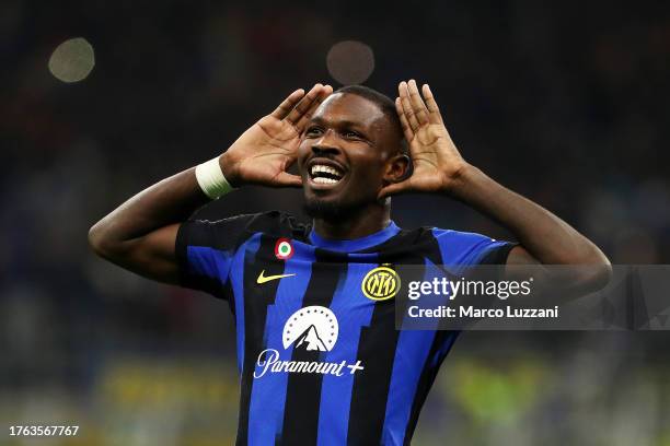 Marcus Thuram of FC Internazionale celebrates after scoring the team's first goal during the Serie A TIM match between FC Internazionale and AS Roma...