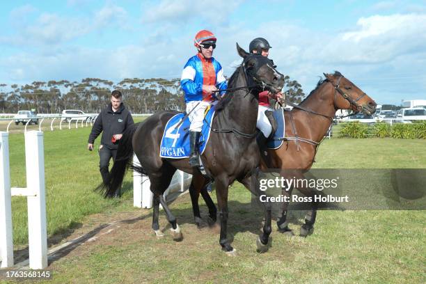 Jarrod Lorensini returns to scale on Dirt On Harry after winning the Valton Feeding Solutions BM58 Handicap at Mortlake Racecourse on November 04,...