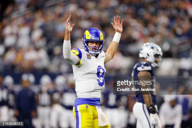 Matthew Stafford of the Los Angeles Rams celebrates a touchdown in the second quarter of a game against the Dallas Cowboys at AT&T Stadium on October...