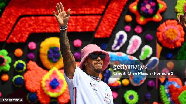 Lewis Hamilton of Great Britain and Mercedes waves to the crowd on the drivers parade prior to the F1 Grand Prix of Mexico at Autodromo Hermanos...