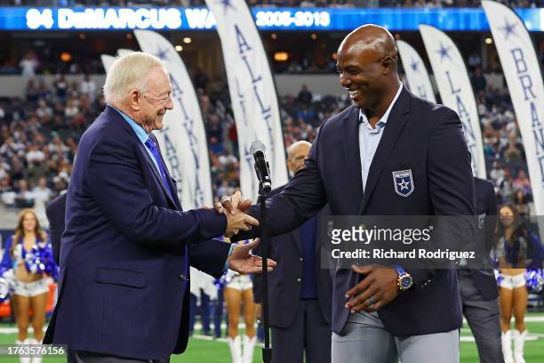 Former Dallas Cowboys defensive end DeMarcus Ware is inducted into the Ring of Honor by Dallas Cowboys owner Jerry Jones during a game against the...
