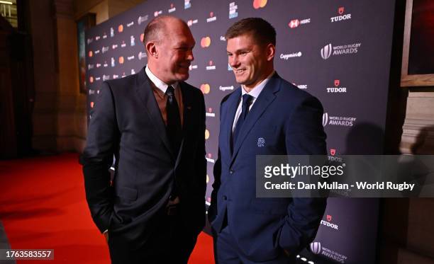 Former South Africa and Saracens player Schalk Burger speaks with Owen Farrell of England on the Red Carpet as they arrive prior to the World Rugby...