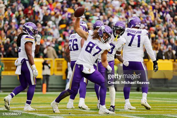 Hockenson of the Minnesota Vikings celebrates a touchdown during the third quarter of a game against the Green Bay Packers at Lambeau Field on...