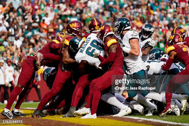 The Washington Commanders defense stuffs the Philadelphia Eagles at the goal line in the third quarter at FedExField on October 29, 2023 in Landover,...