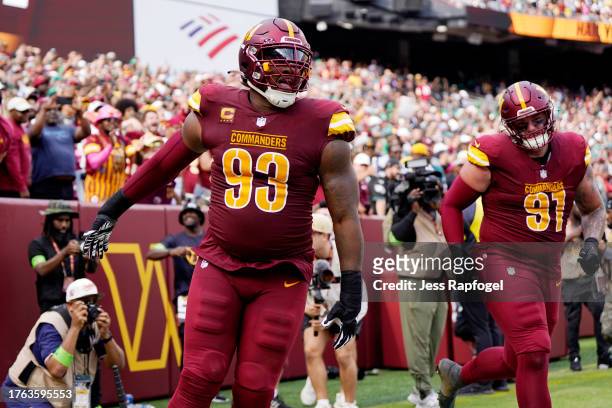 Jonathan Allen of the Washington Commanders celebrates after a turnover in the third quarter of a game aPhiladelphia Eagles at FedExField on October...