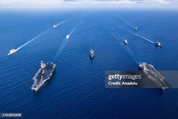 An aerial view of aircraft carriers of the United States Navy USS Gerald R. Ford and USS Dwight D. Eisenhower together in eastern Mediterranean on...
