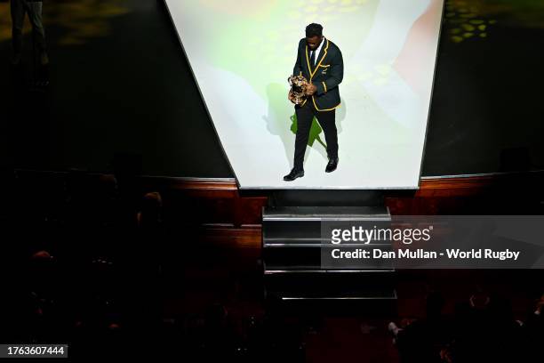 Siya Kolisi of South Africa carries The Web Ellis Cup as he leaves the stage during the World Rugby Awards at Opera Garnier on October 29, 2023 in...
