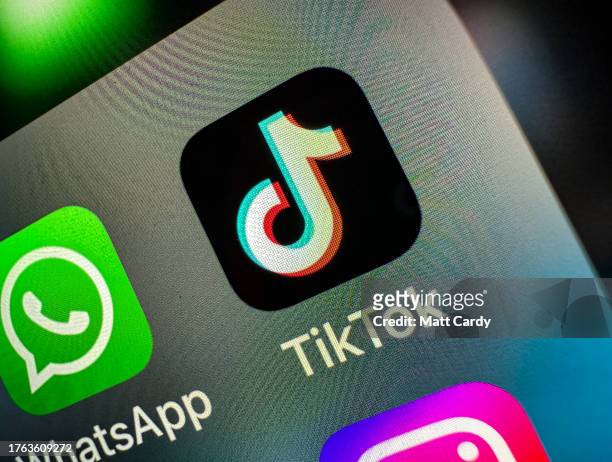 In this photo illustration the logo of online social media and social networking site TikTok on October 29, 2023 in Bath, England. Recently,...