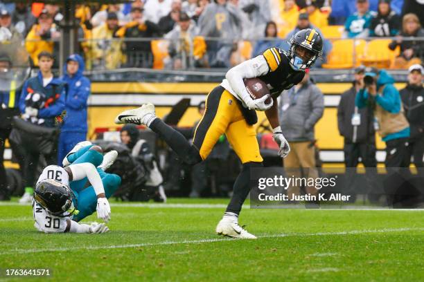 George Pickens of the Pittsburgh Steelers runs to score a touchdown during the third quarter of the game against the Jacksonville Jaguars at Acrisure...